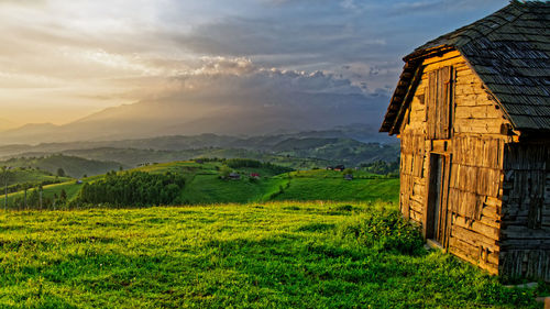 Scenic view of field against mountains