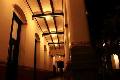 Low angle view of illuminated lights in building