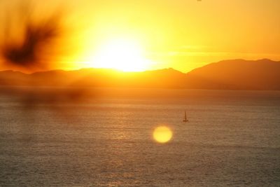 View of calm sea at sunset