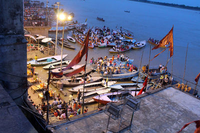 High angle view of boats moored at harbor