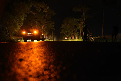 Surface level of road on field at night