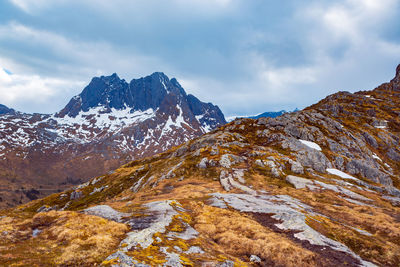 Scenic view of snowcapped mountains against sky