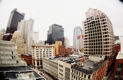 Low angle view of modern buildings in city