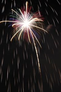 Close-up of firework display at night