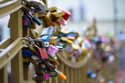 Close-up of padlocks on railing