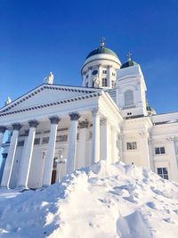 Low angle view of building against clear blue sky