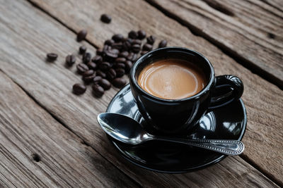 High angle view of coffee cup on table