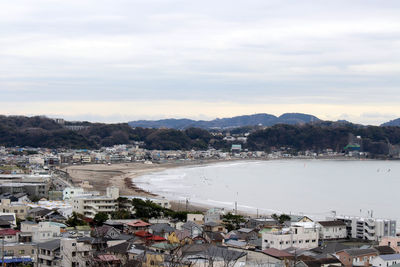 High angle shot of townscape against sky