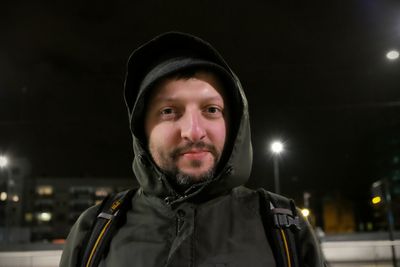 Portrait of young man in snow