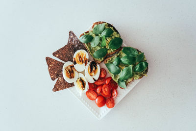 High angle view of food against white background