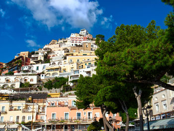 Buildings in city against sky