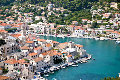 High angle view of town by sea