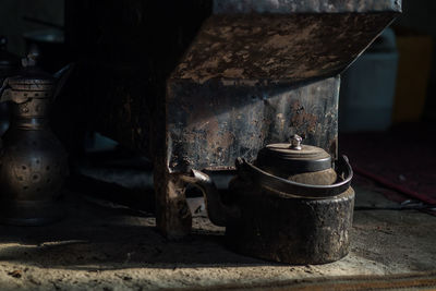Close-up of rusty teapot