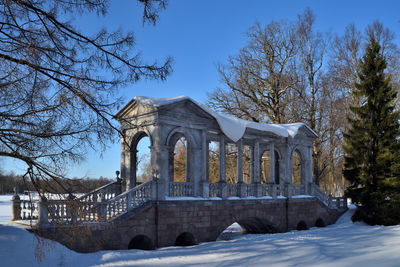 Building against sky during winter