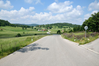 Mountain winding road to hills and valleys