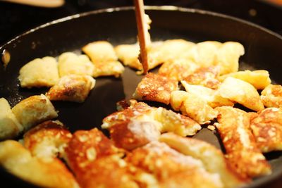 Close-up of food being cooked in pan