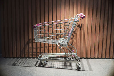 Close-up of shopping cart on table