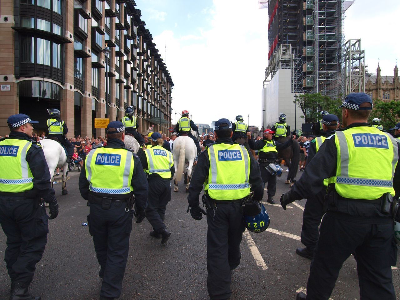 GROUP OF PEOPLE IN CITY STREET