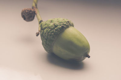 Close-up of fruit against white background