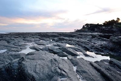 Scenic view of sea against cloudy sky