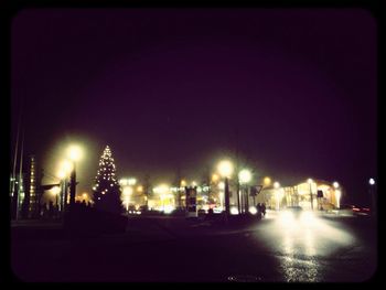 Illuminated street light at night