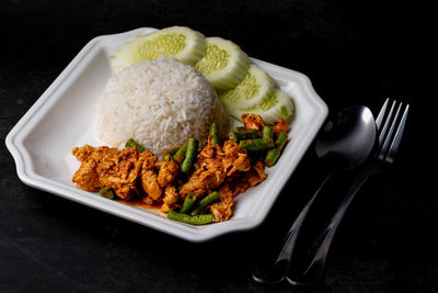 Close-up of food served on table