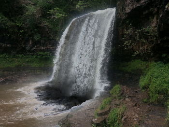 Stream flowing through rocks