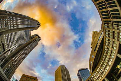 Low angle view of skyscrapers against sky