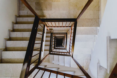 Directly below shot of spiral staircase in building