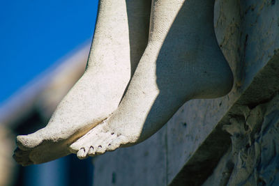 Close-up of sculpture against wall