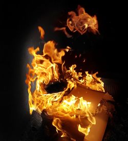 Close-up of fire in the dark