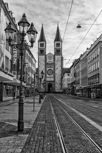 Railroad track on street in city