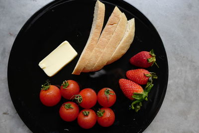 High angle view of cherries in bowl