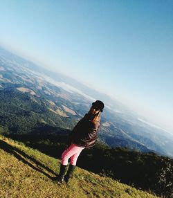 Woman standing on landscape