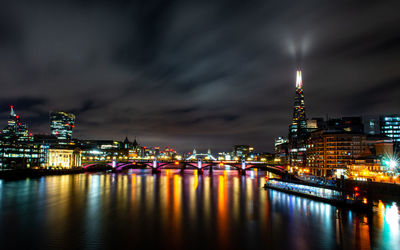 Illuminated buildings at waterfront