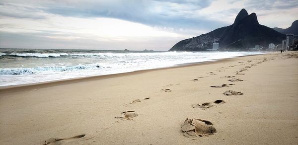 Scenic view of beach against sky