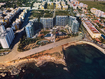 High angle view of river amidst buildings in city