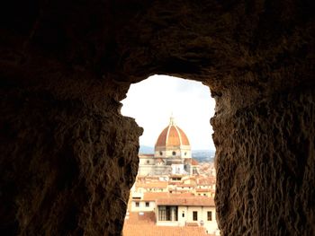 Historic building seen through arch