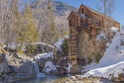 Crystal mills waterfall and house