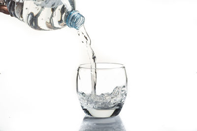 Close-up of water splashing in drinking glass