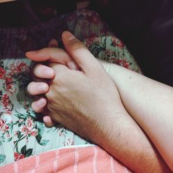 Couple hand holding, warm and romantic love pictured