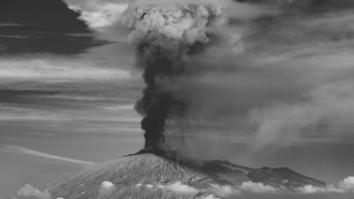 Panoramic view of volcanic mountain against sky