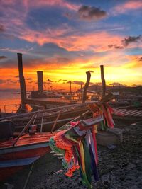 Scenic view of beach against sky during sunset