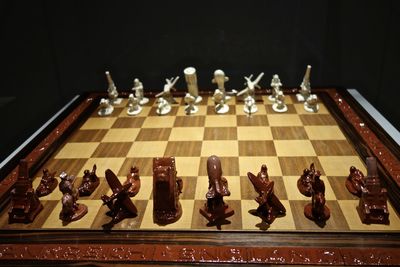 High angle view of chess pieces on table