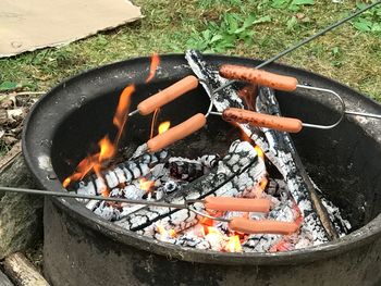 High angle view of bonfire on barbecue grill