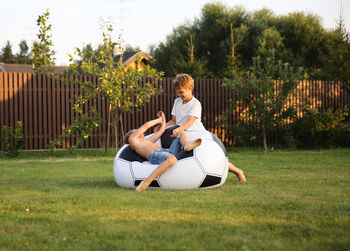 Boys playing on grass