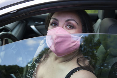 Portrait of woman in car