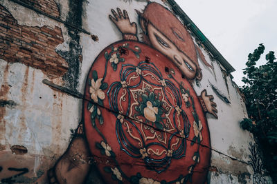 Low angle view of graffiti on wall