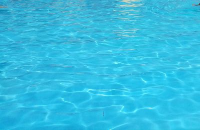 Full frame shot of blue water in swimming pool