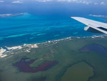 Aerial view of sea and airplane